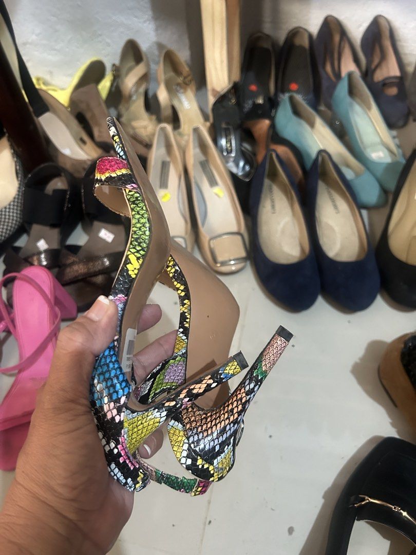Una Rosa (Category: Heels) located in Cavite. Submitted by cecitrifthshop (Listing ID 1469421082, Image 3). Description: Multi colored snake print high heeled ankle strap sandals from UNA Rosa brand size .