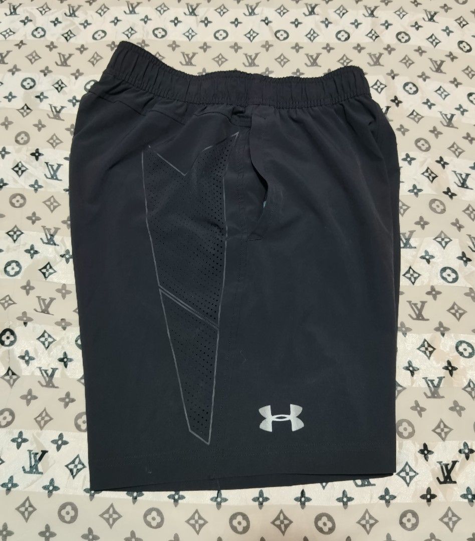 Under Armour Black Athletic Shorts Size S (Category: Shorts) located in Abuyog. Submitted by scottcarl06 (Listing ID 1469480970, Image 3). Description: - Brand: Under Armour - Color: Solid Black - Size: Small (Loose Fit) - Material: Lightweight and breathable - Waistband: Elastic with inner UA branding - Design: Perforated side panels with silver logo hit near hem - Extras: Convenient side pockets - Ideal for: Gym workouts, running, and active li
