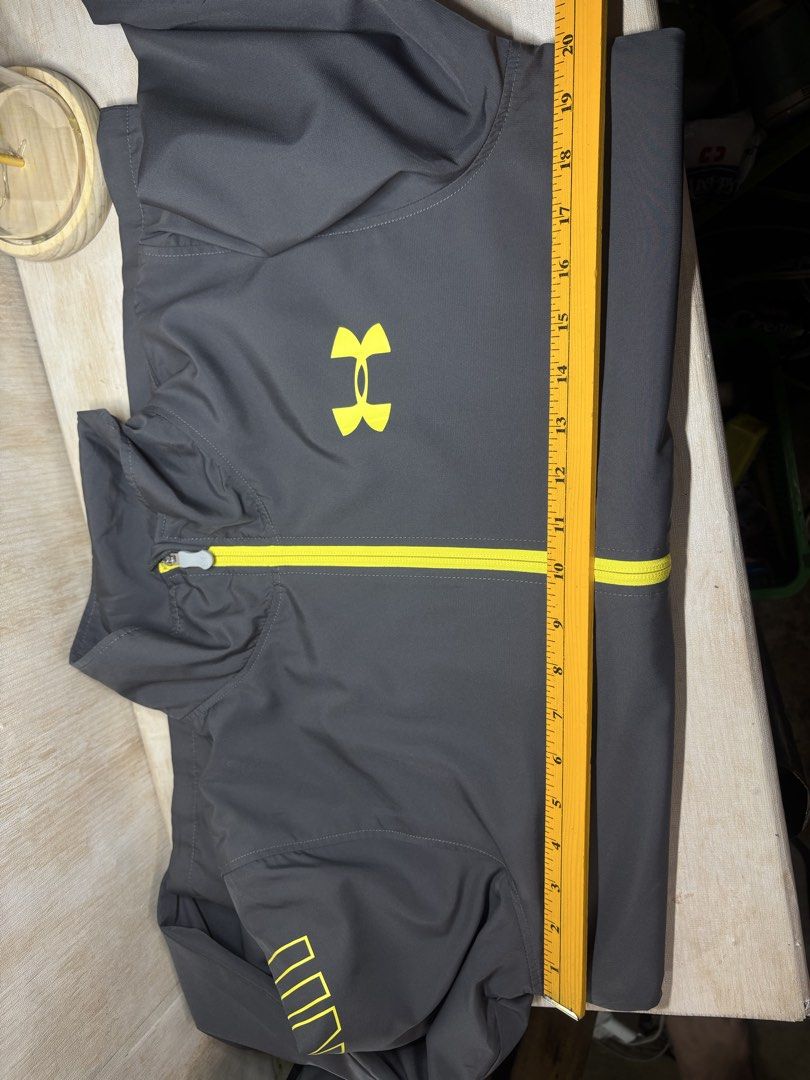 UNDER ARMOUR FRESH WOVEN FULLZIP JACKET (Category: Coats, Jackets and Outerwear) located in Cabuyao City. Submitted by pormanation-thrift-store (Listing ID 1469421946, Image 2). Description: UNDER ARMOUR FRESH WOVEN FULLZIP JACKET Condition: LIKE NEW Color rate: 10/10 (PWEDE SA MASELAN) Size: LARGE (ASIAN) Dimes: 20”Wx26”L Issue: NONE✅ Price: 1500.