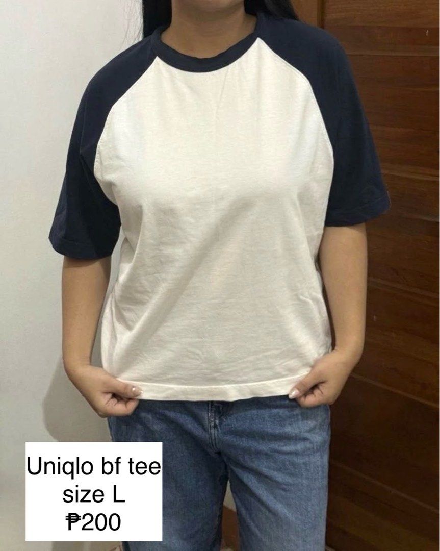 Uniqlo Boyfriend Tee Size L (Category: Shirts) located in Manila. Submitted by sstash444 (Listing ID 1469410642, Image 1). Description: - Brand: Uniqlo - Style: Raglan boyfriend tee (dark blue sleeves, white body) - Size: L (relaxed, comfortable fit) - Condition: Worn just a few times, great shape - Versatile: Easy to pair with jeans or shorts.