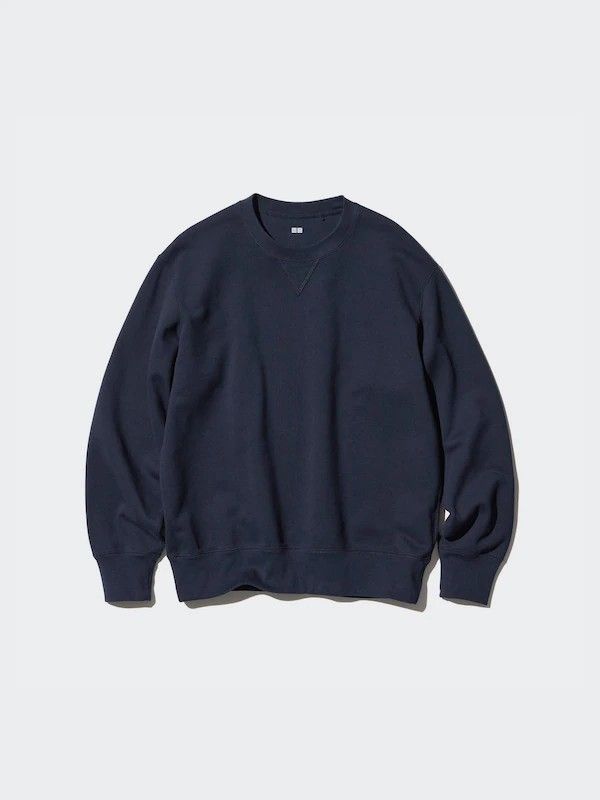 Uniqlo Classic V-Insert Crewneck Sweatshirt (Category: Coats, Jackets and Outerwear) located in Baliuag. Submitted by retrovault83 (Listing ID 1469397396, Image 1). Description: ✨ Condition: 9/10 – Asnew Preloved Condition 📏 Measurements (Flat Lay, Tagged Size L): • Pit to Pit: 23 • Length: 27 ✅ Details: • Solid dark navy blue colorway featuring a classic "V-stitch" / "V-insert" triangular detail at the collar • 100% Cotton body construction for