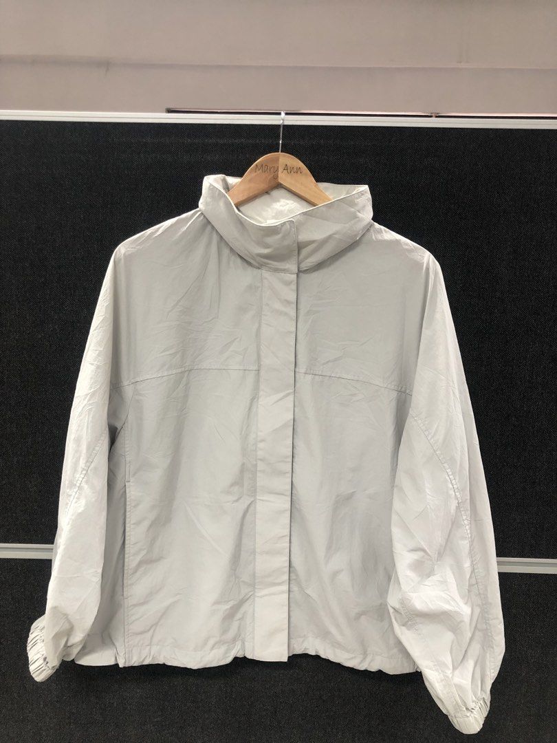 Uniqlo Hooded Parka Light Grey Jacket (Category: Coats, Jackets and Outerwear) located in Angeles City. Submitted by maryannsantos (Listing ID 1469466621, Image 3). Description: - Brand: Uniqlo - Color: Light grey (neutral tone that matches everything) - Material: Lightweight, perfect for breezy days - Design: Hooded, high collar, full zipper with snap-button placket - Fit: Relaxed drop shoulders - Features: Practical side pockets and adjustable 