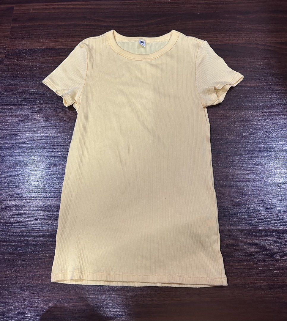 Uniqlo Long Yellow Fitted Top (Category: Shirts) located in Manila. Submitted by wengobaco (Listing ID 1469549272, Image 1). Description: Long yellow fitted top Brighter yellow in person Size S (Can fit XS-S) rfs: decluttering and used only once for a school event (no issues) Loc: QC MOP: GCash only MOD: Lalamove/Grab (buyer will book and shoulder df).