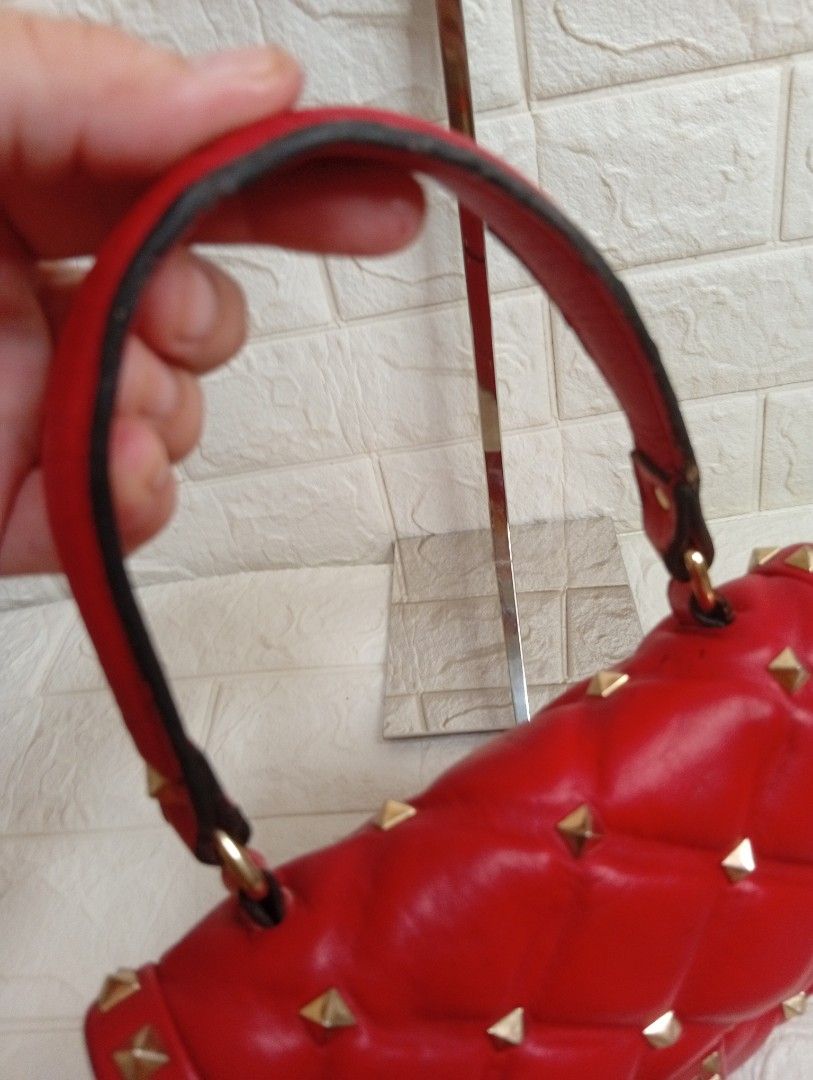 Valentino Garavani Candystud Medium Top Handle Bag (Category: Luxury Bags & Wallets) located in Las Pinas. Submitted by etoksi1234 (Listing ID 1469559439, Image 3). Description: Pre-loved Valentino Garavani Candystud Medium Top Handle Bag in Rosso Valentino red, crafted from quilted lambskin leather with antique brass-finish hardware, pyramid studs, a top handle, and a detachable shoulder strap..