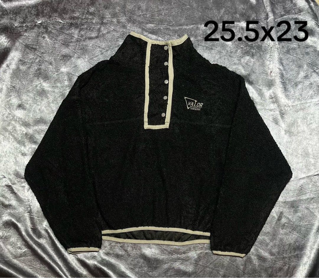 Valor Conquers Black Fleece Snap Pullover (Category: Coats, Jackets and Outerwear) located in Cavite. Submitted by bellewii (Listing ID 1469527715, Image 1). Description: - Color & Style: Black fleece pullover with stylish contrast trim - Design: Snap button placket at the collar with embroidered Valor Conquers logo on the chest - Material: Ultra-soft, fuzzy texture all over for maximum warmth and comfort - Measurements: 25.5 inches (length) x 23