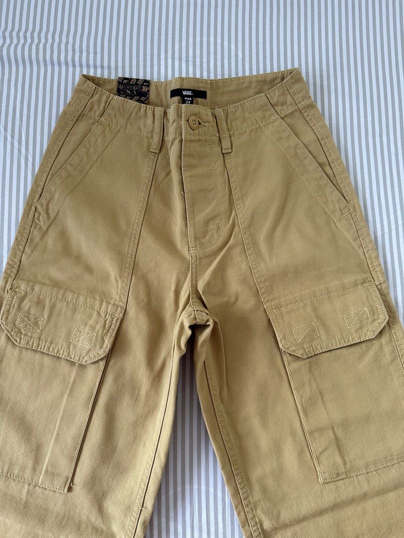 Vans Arroyo Wide Leg Cargo Pants Size 24 (Category: Jeans) located in Quezon City. Submitted by 4k_cam (Listing ID 1469454913, Image 1). Description: - Brand: Vans - Vans Arroyo Wide Leg Cargo Pants - Color: Tan - Size: 24 - Material: Heavy canvas - Closure: Button closure and zip fly - Pockets: Front slash pockets, side cargo pockets with flaps, and back patch pockets - Condition: Brand new with tags still attached to the waistband.