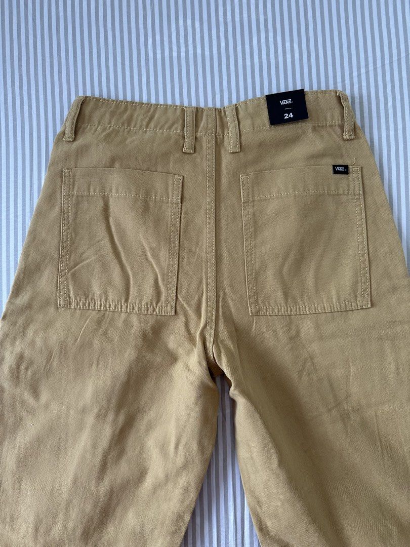 Vans Arroyo Wide Leg Cargo Pants Size 24 (Category: Jeans) located in Quezon City. Submitted by 4k_cam (Listing ID 1469454913, Image 2). Description: - Brand: Vans - Vans Arroyo Wide Leg Cargo Pants - Color: Tan - Size: 24 - Material: Heavy canvas - Closure: Button closure and zip fly - Pockets: Front slash pockets, side cargo pockets with flaps, and back patch pockets - Condition: Brand new with tags still attached to the waistband.