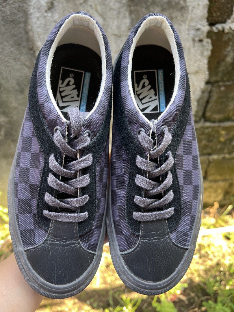 Vans Bold NI "Black Asphalt" (Style Code: VN0A5DYAKOU) (Category: Sneakers) located in Calamba. Submitted by honeyka17 (Listing ID 1469455017, Image 3). Description: - Brand/Model: Vans Low-Top Sneakers - Design: Black and grey checkerboard pattern with suede side stripes - Details: Black leather toe caps, heel wraps, and grey laces - Comfort: UltraCush insoles for extra cushioning - Soles: Chunky dark grey rubber soles with red 'Off The Wall' he
