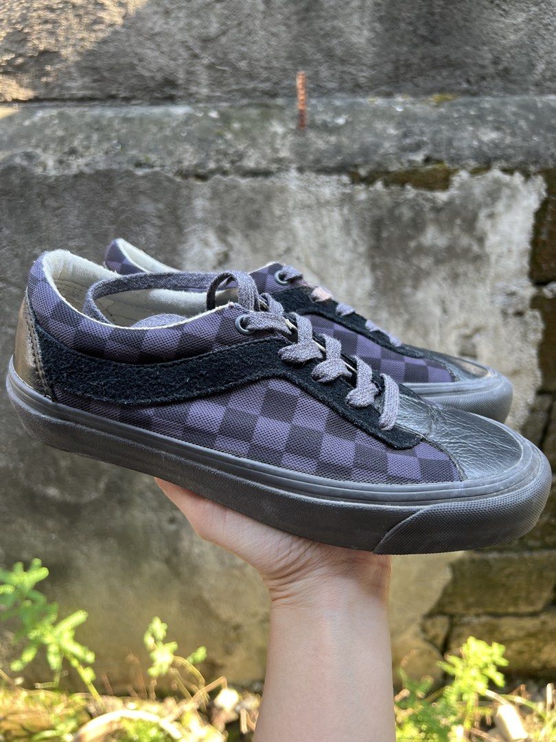 Vans Bold NI "Black Asphalt" (Style Code: VN0A5DYAKOU) (Category: Sneakers) located in Calamba. Submitted by honeyka17 (Listing ID 1469455017, Image 2). Description: - Brand/Model: Vans Low-Top Sneakers - Design: Black and grey checkerboard pattern with suede side stripes - Details: Black leather toe caps, heel wraps, and grey laces - Comfort: UltraCush insoles for extra cushioning - Soles: Chunky dark grey rubber soles with red 'Off The Wall' he