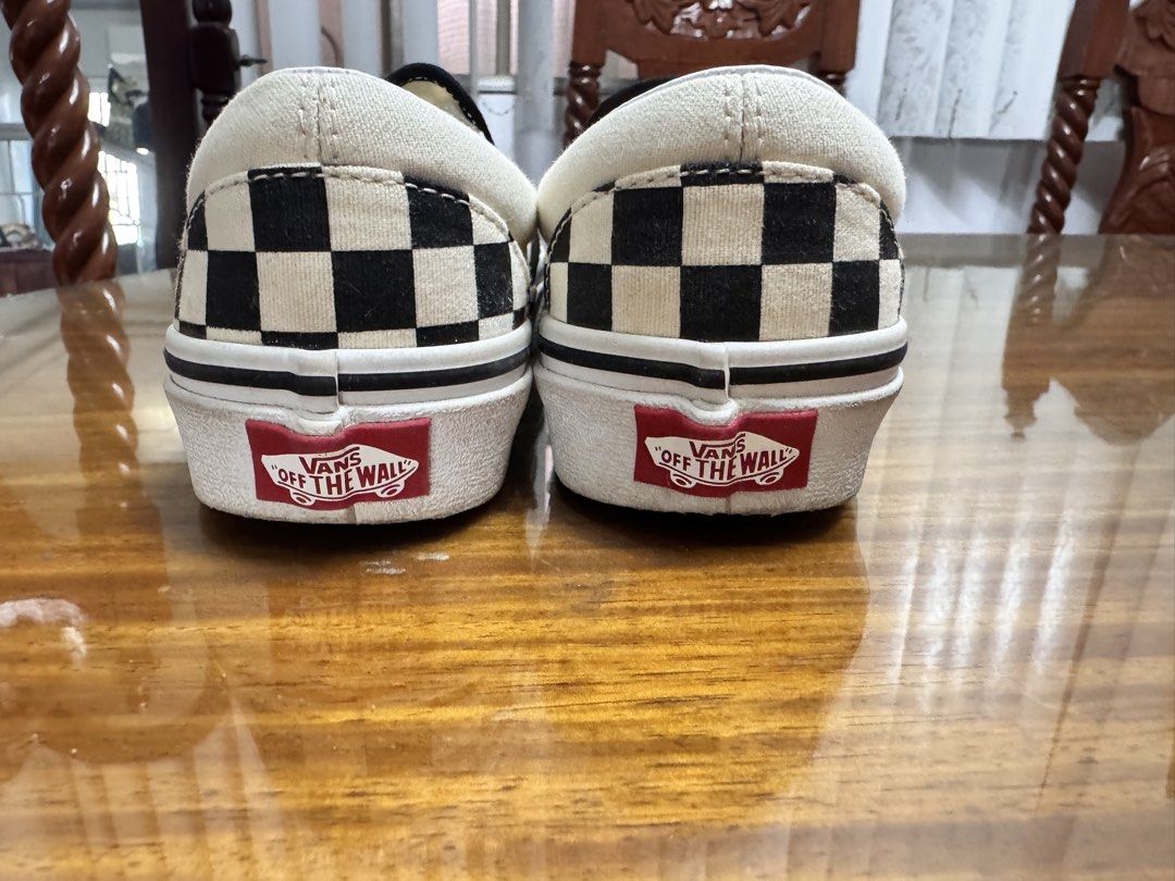 Vans Classic Checkerboard Slip-On Sneakers (Category: Sneakers) located in Batangas. Submitted by ayeeftz (Listing ID 1469424494, Image 3). Description: - Style: Classic slip-on with iconic black and white checkerboard pattern - Size: US Men 3.5 / US Women 5 / EUR 34.5 / 21.5 cm - Details: Features elastic side accents and red 'Off The Wall' heel license plate.