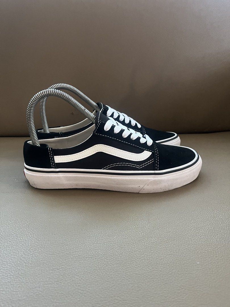 Vans Old Skool Black and White Sneakers (Category: Sneakers) located in Lapu-Lapu City. Submitted by bravepenguin_37aa61 (Listing ID 1469396159, Image 2). Description: - Authentic Vans Old Skool sneakers in classic black and white colorway - Durable black canvas upper with iconic white leather side stripe - Clean treads with minimal wear and pristine rubber outsoles - Maintained with metal spring shoe trees to preserve shape - Comes with original
