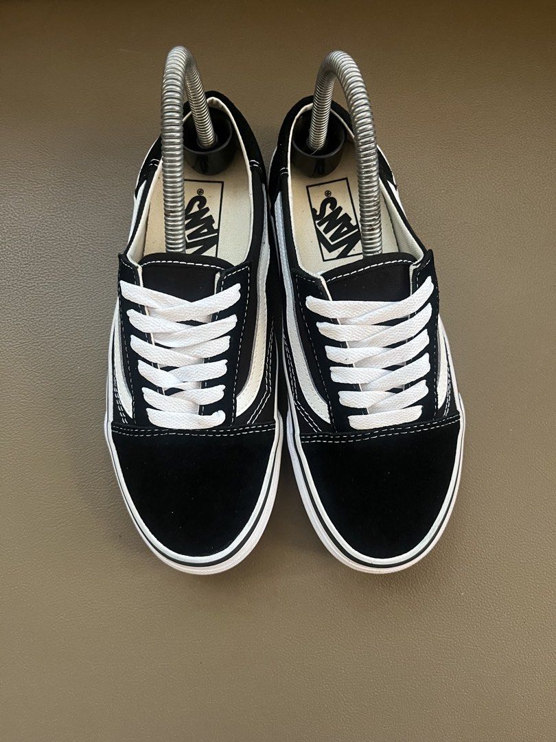 Vans Old Skool Black and White Sneakers (Category: Sneakers) located in Lapu-Lapu City. Submitted by bravepenguin_37aa61 (Listing ID 1469396159, Image 3). Description: - Authentic Vans Old Skool sneakers in classic black and white colorway - Durable black canvas upper with iconic white leather side stripe - Clean treads with minimal wear and pristine rubber outsoles - Maintained with metal spring shoe trees to preserve shape - Comes with original