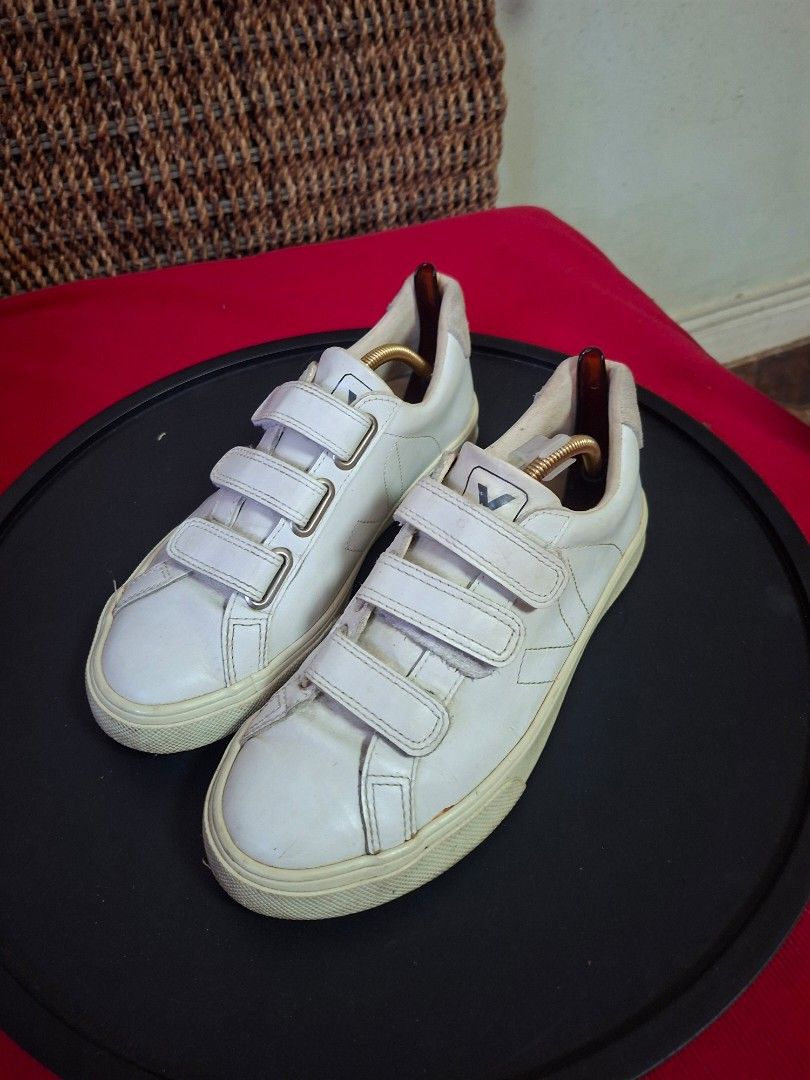 Veja Esplar Velcro White Leather Sneakers (Category: Sneakers) located in Ilagan. Submitted by dbankerscloset (Listing ID 1469452231, Image 3). Description: - Brand: Veja - Color: White - Style: Low-top leather sneakers with triple velcro straps and iconic side V logo stitching - Condition: Uppers are clean with minor creasing; soles show normal wear from walking - Perfect everyday casual footwear.
