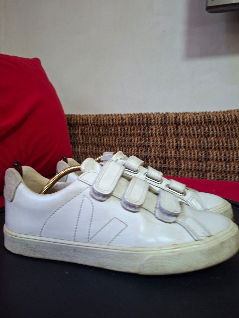 Veja Esplar Velcro White Leather Sneakers (Category: Sneakers) located in Ilagan. Submitted by dbankerscloset (Listing ID 1469452231, Image 1). Description: - Brand: Veja - Color: White - Style: Low-top leather sneakers with triple velcro straps and iconic side V logo stitching - Condition: Uppers are clean with minor creasing; soles show normal wear from walking - Perfect everyday casual footwear.