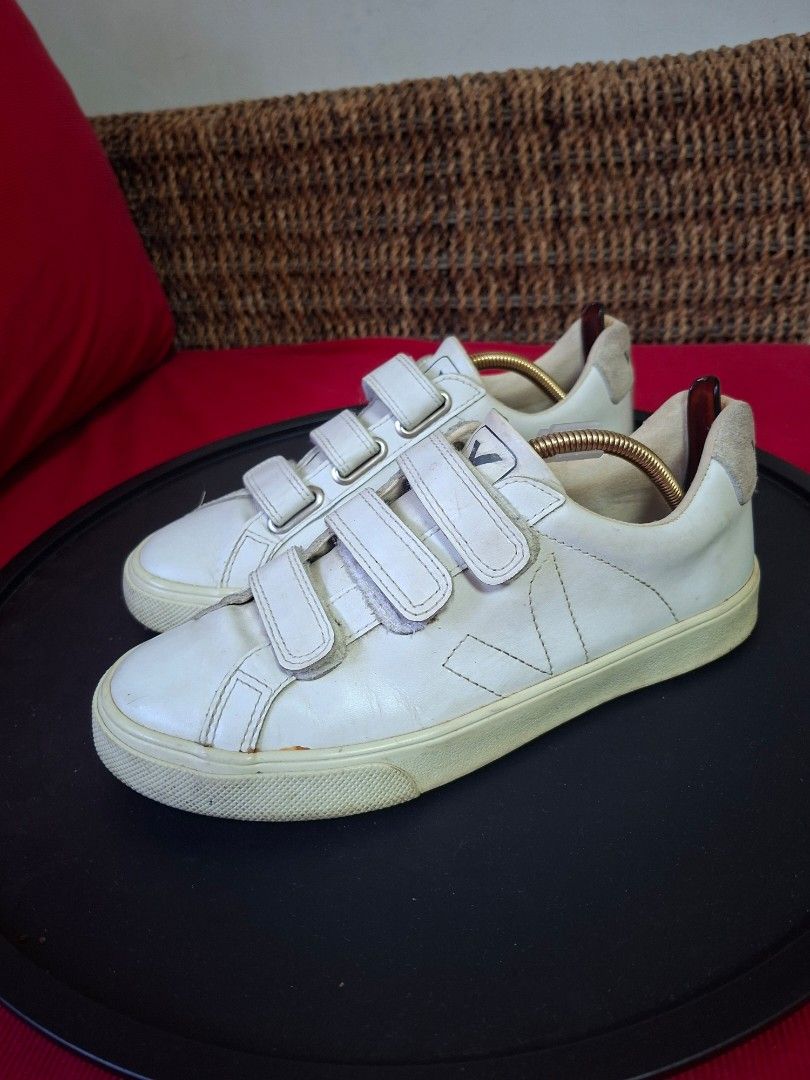 Veja Esplar Velcro White Leather Sneakers (Category: Sneakers) located in Ilagan. Submitted by dbankerscloset (Listing ID 1469452231, Image 2). Description: - Brand: Veja - Color: White - Style: Low-top leather sneakers with triple velcro straps and iconic side V logo stitching - Condition: Uppers are clean with minor creasing; soles show normal wear from walking - Perfect everyday casual footwear.