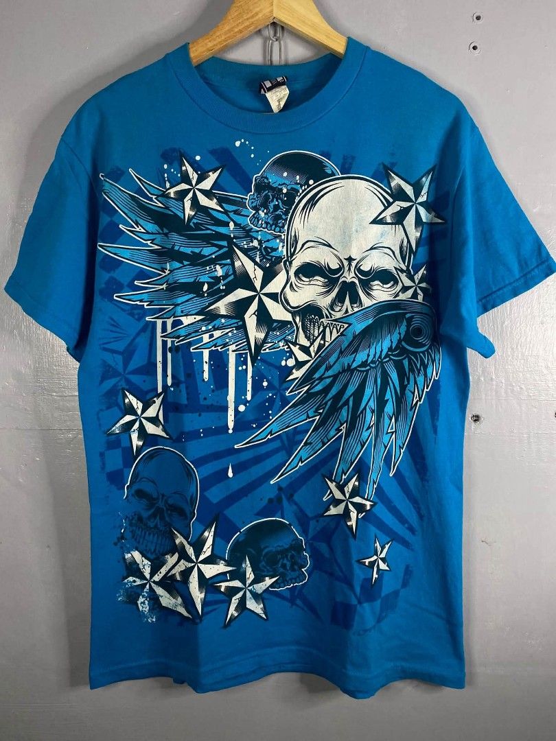 Vintage 00s Hybrid Winged Skull Tee (Category: Tshirts & Polo Shirts ) located in Cabuyao City. Submitted by junkthreads.finds (Listing ID 1469510368, Image 1). Description: Tag: Official Hard Tag Dimes: 20x29 Issue(s): Hairlines/cracks and 1 pinhole Color may vary due to lightning..