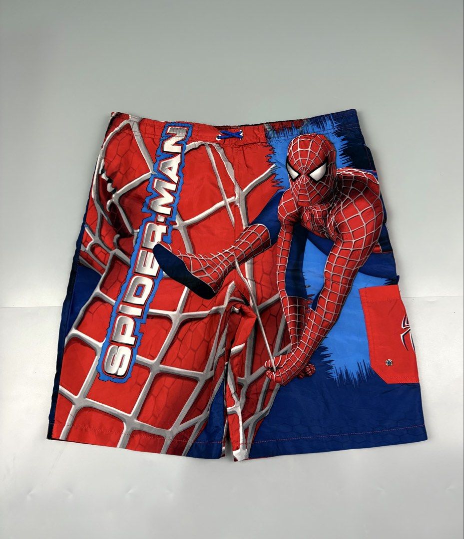 Vintage 2004 (Category: Shorts) located in Manila. Submitted by _remyboyz (Listing ID 1469422888, Image 1). Description: Vintage Spiderman board shorts Dated 2004 Measurement Size:34/20/10.5 Color rate:10/10 Condition:Excellent condition Flaw/Issue:None .