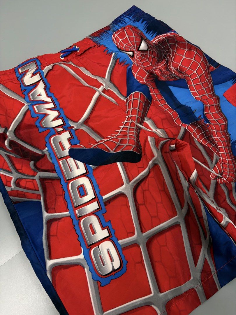 Vintage 2004 (Category: Shorts) located in Manila. Submitted by _remyboyz (Listing ID 1469422888, Image 3). Description: Vintage Spiderman board shorts Dated 2004 Measurement Size:34/20/10.5 Color rate:10/10 Condition:Excellent condition Flaw/Issue:None .