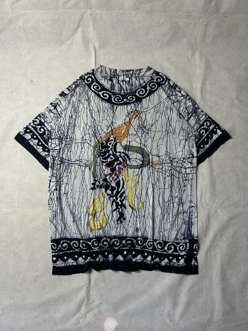 Vintage AOP Crackle - Texture Batik Pattern T Shirt (Category: Tshirts & Polo Shirts ) located in Iloilo. Submitted by noy_thrift (Listing ID 1469491796, Image 1). Description: Vintage AOP Crackle - Texture Batik Pattern T Shirt Large Width 22 Length 29 Excellent Condition SSTAW Issue: Stain .