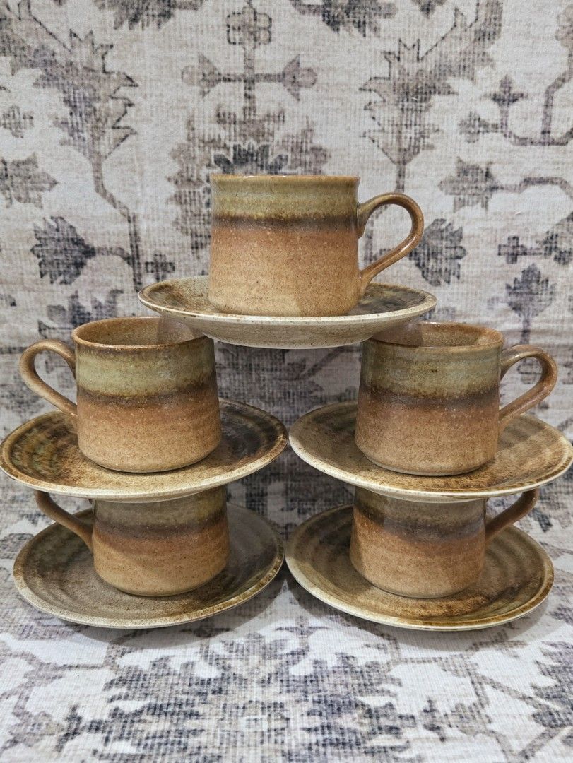 Vintage ceramic cup and saucer set (per pair) (Category: Coffee & Tea Tableware) located in Manila. Submitted by cwknds (Listing ID 1469491928, Image 1). Description: ​​warm mid-century studio ceramics ​cup and saucer set of five. earthy toasted clay palette with handglazed olive and honey tan accents across an organic silhouette. • cup: 6 x 6.5 cm • saucer: 13.7 cm • vintage unused set of 5 w/ box • ₱400/pair • ₱1,500 set of 5 pairs ~ personally