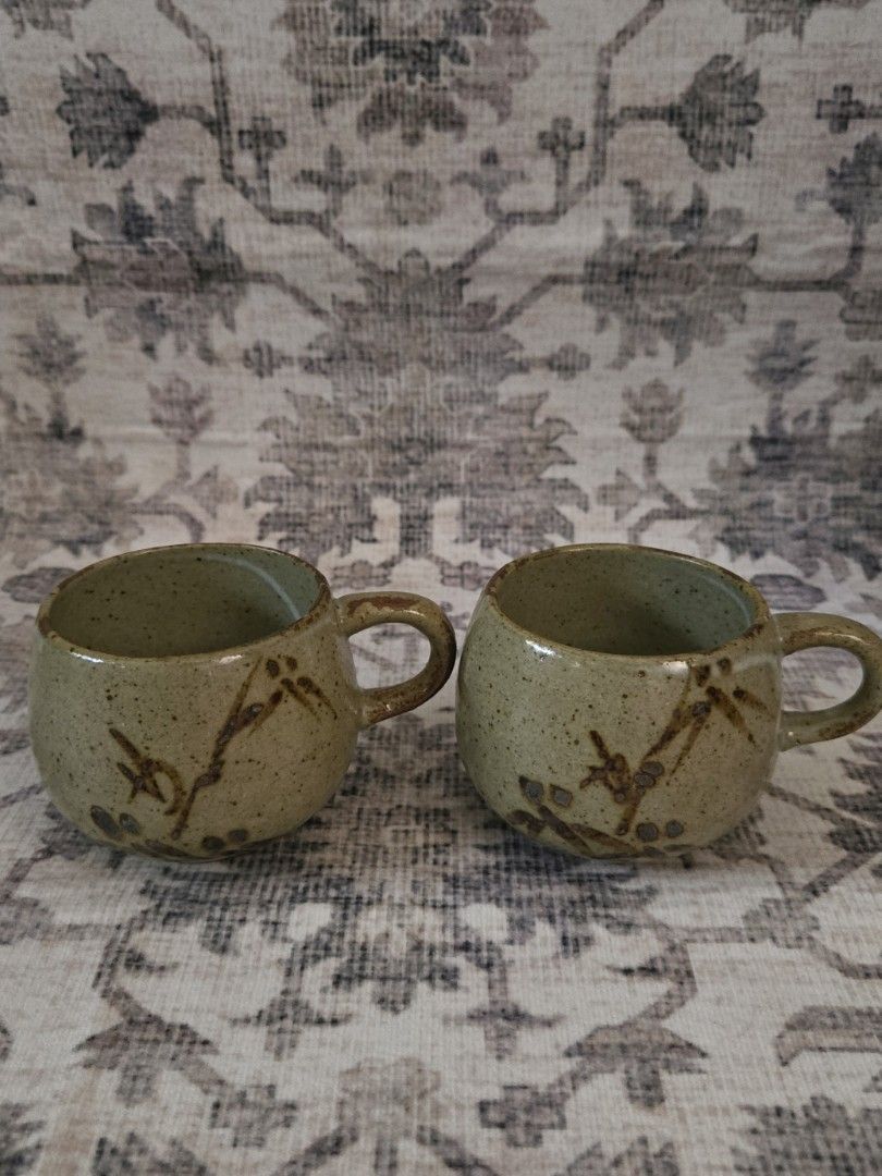 Vintage ceramic cups bundle set (2 pcs) (Category: Coffee & Tea Tableware) located in Manila. Submitted by cwknds (Listing ID 1469488282, Image 1). Description: a pair of vintage japanese speckled stoneware cups featuring a rounded, bulbous silhouette, handpainted bamboo details, and a glossy moss glaze. • 6.5 x 6.5 cm • potter's mark ~ personally sourced&curated.