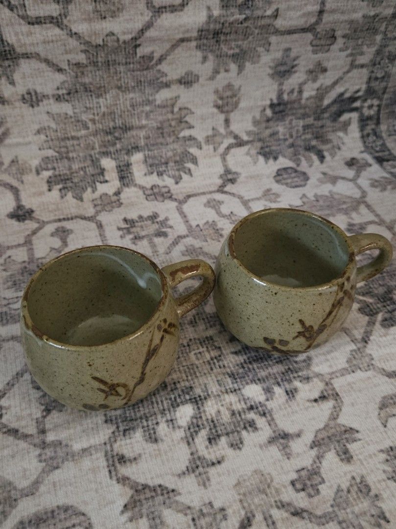 Vintage ceramic cups bundle set (2 pcs) (Category: Coffee & Tea Tableware) located in Manila. Submitted by cwknds (Listing ID 1469488282, Image 2). Description: a pair of vintage japanese speckled stoneware cups featuring a rounded, bulbous silhouette, handpainted bamboo details, and a glossy moss glaze. • 6.5 x 6.5 cm • potter's mark ~ personally sourced&curated.