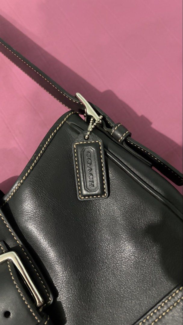 Vintage Coach Black Leather Shoulder Bag (Category: Luxury Bags & Wallets) located in Manila. Submitted by declutterwithesca (Listing ID 1469548514, Image 3). Description: - Brand: Coach Y2K vintage shoulder bag - Material: Premium black leather with contrast stitching - Hardware: Silver-tone with front buckle closure and classic hangtag charm - Condition: Well-maintained negotiable for sure buyers :) .