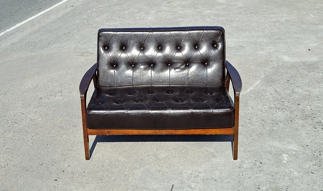 Vintage midcentury 2-seater black sofa (Category: Sofas) located in Mabalacat. Submitted by thenewcraf32843 (Listing ID 1469401243, Image 3). Description: Vintage midcentury 2-seater black sofa In great condition. Made in Japan, nitori. Dimensions: L45.8 x W27.5 x Sh16 x H30.5 inches Price: 8k only We do shipping via lalamove / victory liner drop & go. Dm tp inquire.
