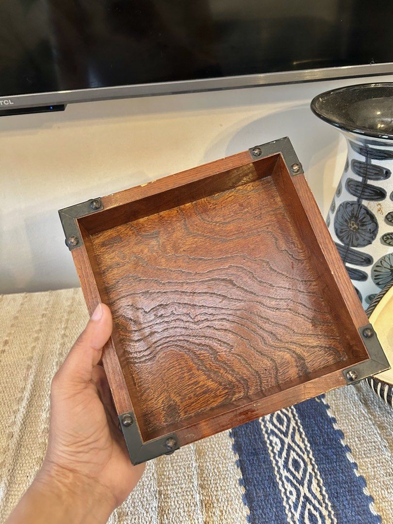 VINTAGE MINI WOODEN BOX (Category: Storage Boxes & Baskets) located in Polangui. Submitted by joycehaul (Listing ID 1469399453, Image 2). Description: • Material: Polished brown or walnut-finished wood with visible grain. • Accents: Black or dark metal corner braces secured with small rivets or screws on the exterior edges. • Shape: Open-top square design. Japan Surplus Items Location: Albay We ship via J&T courier .