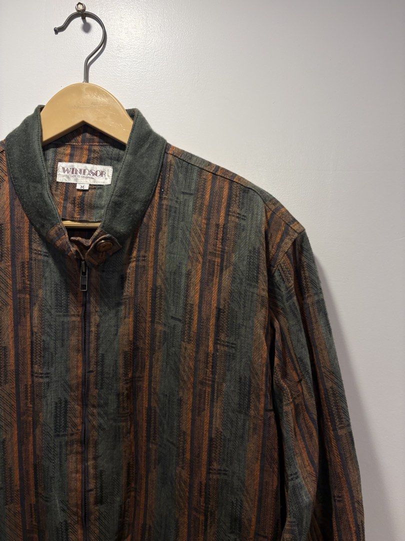 Vintage Multi-color Striped Zip-up Blouson Jacket (Category: Coats, Jackets and Outerwear) located in Bacolod City. Submitted by moboandmoga (Listing ID 1469475737, Image 3). Description: Vintage multi-color striped zip-up blouson jacket features a stand collar, ribbed cuffs and hem, and slanted front pockets. Size: Medium (Boxy fit) Vintage Condition (Sizing info) Width: 22.5 inches Length: 25.5”.
