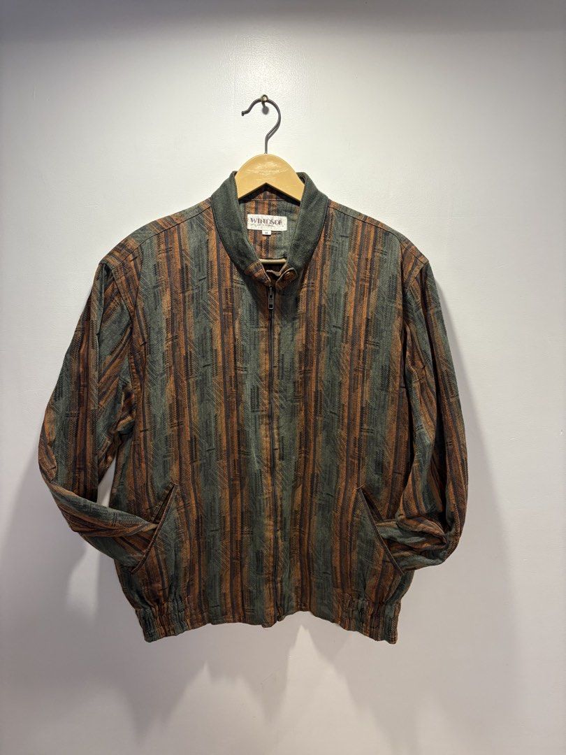 Vintage Multi-color Striped Zip-up Blouson Jacket (Category: Coats, Jackets and Outerwear) located in Bacolod City. Submitted by moboandmoga (Listing ID 1469475737, Image 1). Description: Vintage multi-color striped zip-up blouson jacket features a stand collar, ribbed cuffs and hem, and slanted front pockets. Size: Medium (Boxy fit) Vintage Condition (Sizing info) Width: 22.5 inches Length: 25.5”.