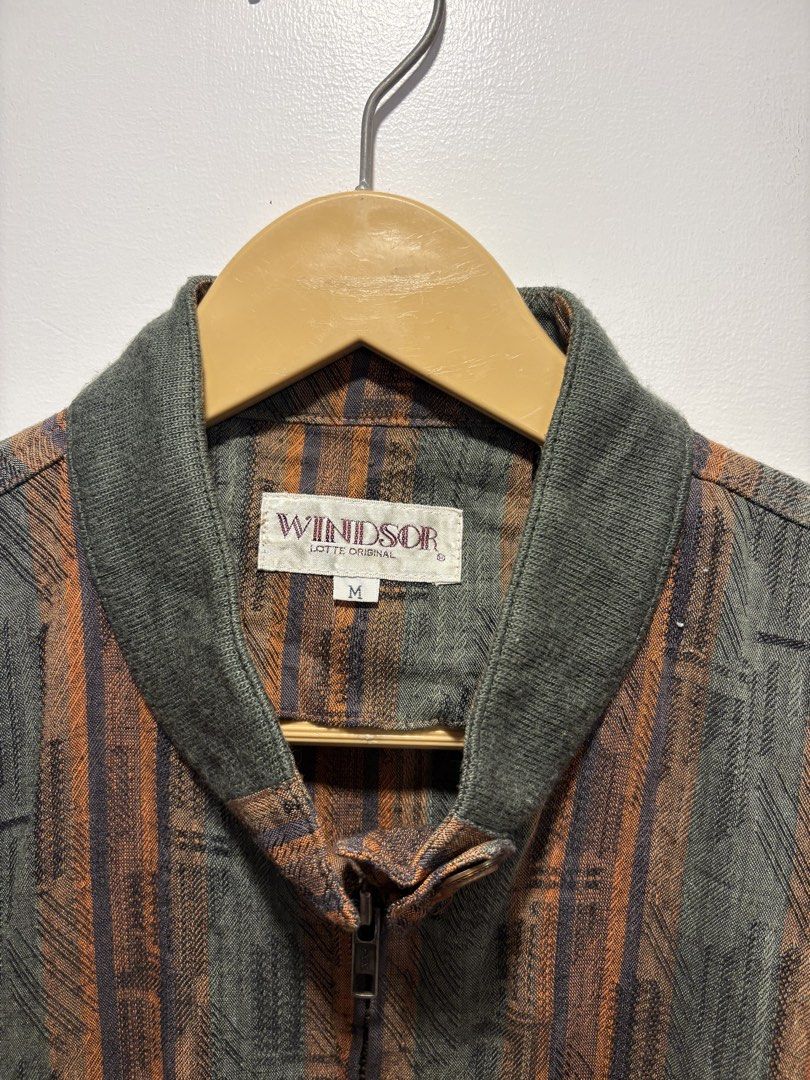 Vintage Multi-color Striped Zip-up Blouson Jacket (Category: Coats, Jackets and Outerwear) located in Bacolod City. Submitted by moboandmoga (Listing ID 1469475737, Image 2). Description: Vintage multi-color striped zip-up blouson jacket features a stand collar, ribbed cuffs and hem, and slanted front pockets. Size: Medium (Boxy fit) Vintage Condition (Sizing info) Width: 22.5 inches Length: 25.5”.