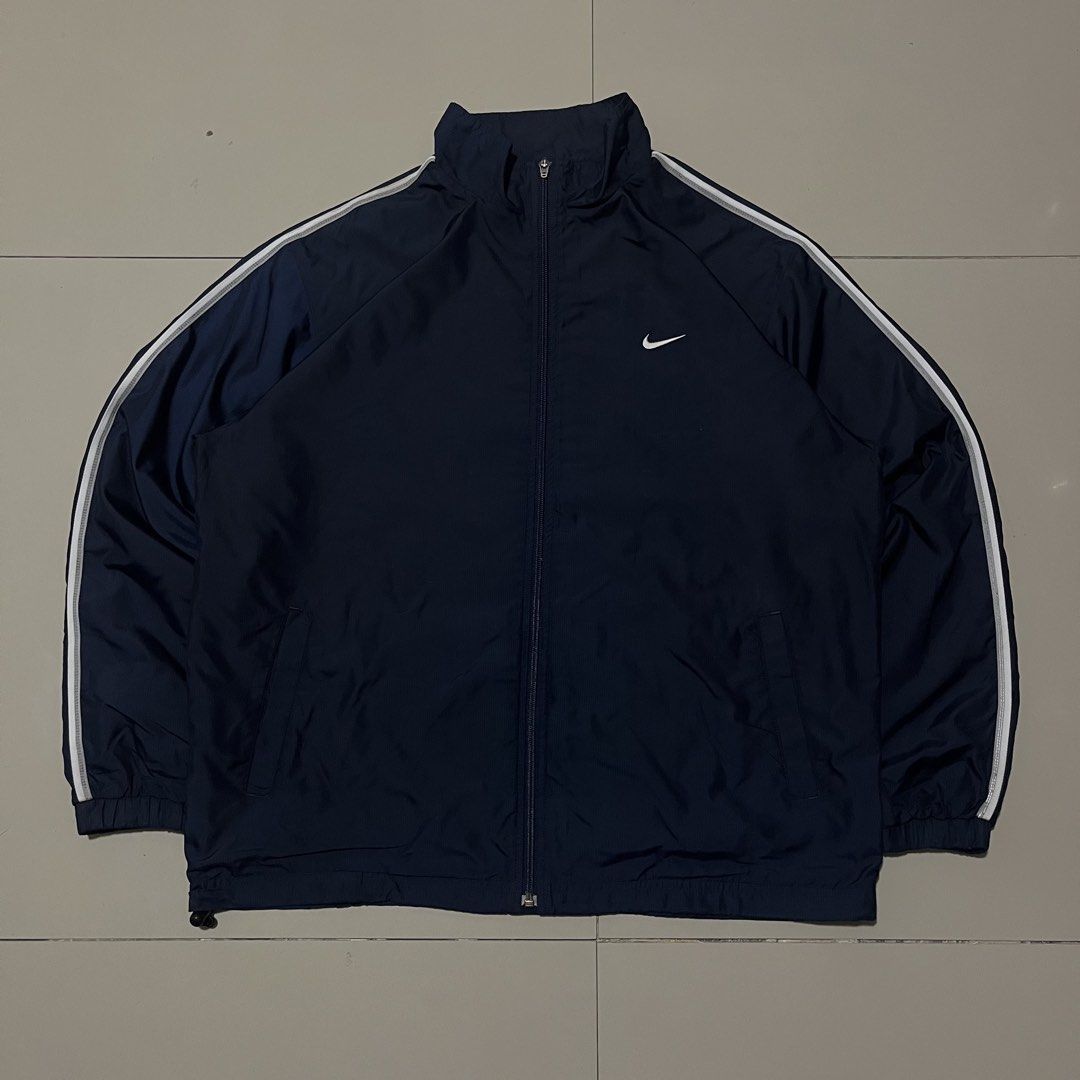 VINTAGE NIKE EMBROID SIDE SWOOSH TRACKER JACKET (Category: Coats, Jackets and Outerwear) located in Manila. Submitted by balanse (Listing ID 1469455863, Image 1). Description: SIZE: L ON TAG DIMES: 24W X 28L EXCELLENT CONDITION. 9.9 HONEST COLOR RATE. ISSUE: NON VISIBLE SCRATCH .