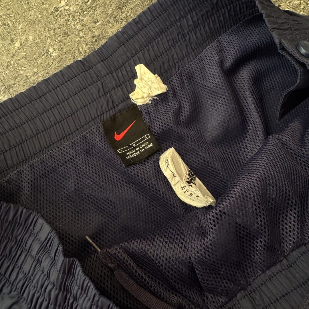 Vintage Nike Track Pants (Category: Activewear) located in Bulacan. Submitted by b4mzz (Listing ID 1469468123, Image 3). Description: Vintage Nike Snap Button Track Pants 🖤 Classic vintage Nike pants with side snap buttons and a relaxed streetwear fit. 📏 Waist: 34” | Length: 41” | Leg Opening: 11” ✨ Condition: Excellent ⚠️ Issue: Missing hem button 💬 Open for reasonable offers!.