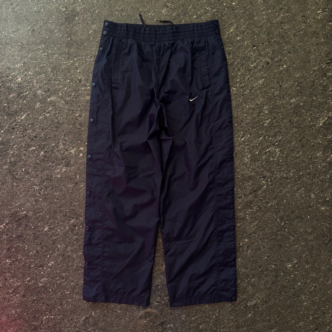 Vintage Nike Track Pants (Category: Activewear) located in Bulacan. Submitted by b4mzz (Listing ID 1469468123, Image 2). Description: Vintage Nike Snap Button Track Pants 🖤 Classic vintage Nike pants with side snap buttons and a relaxed streetwear fit. 📏 Waist: 34” | Length: 41” | Leg Opening: 11” ✨ Condition: Excellent ⚠️ Issue: Missing hem button 💬 Open for reasonable offers!.