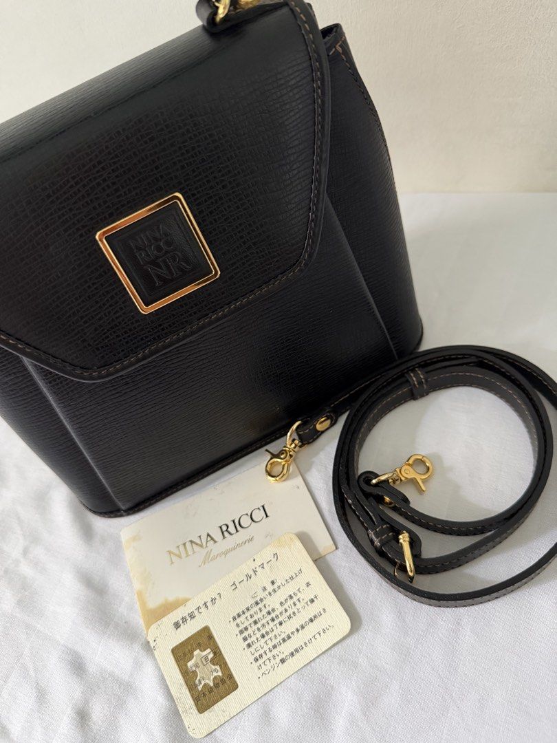VINTAGE NINA RICCI STRUCTURED 2 WAY (Category: Sling Bags) located in Manila. Submitted by meldydsant58389 (Listing ID 1469431454, Image 3). Description: Vintage Nina Ricci Structured 2 Way Bag Condition: Like New Condition (May konting tuklap lang but still classy) Selling Price: ₱2,000 but still negotiable .
