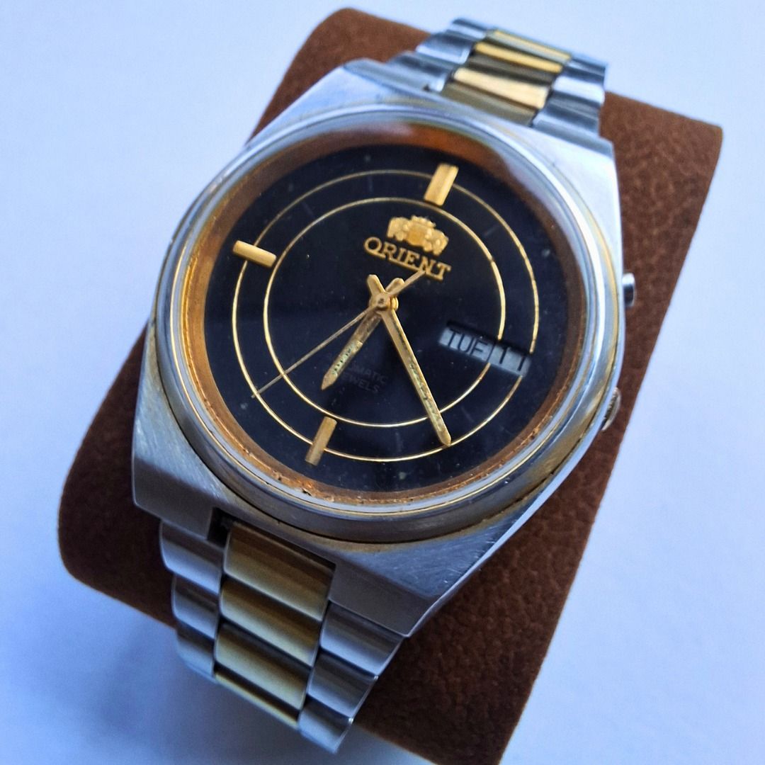 Vintage Orient Automatic 21 Jewels (Category: Luxury Watches) located in Calamba. Submitted by mrq.io (Listing ID 1469484313, Image 1). Description: 100% working, adjustable Day/Date Quickset Needs service, naitago nang matagal sa drawer Replaced bracelet to Seiko Two Tone bracelet 📦 Shipping available nationwide 📍 Calamba, Laguna.
