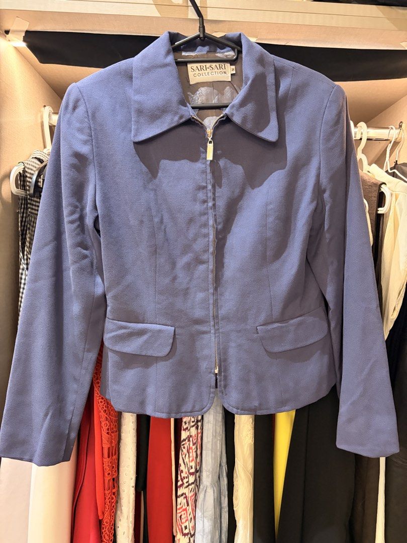 Vintage Sari-Sari Collection Blue Zip-Up Jacket (Category: Coats, Jackets and Outerwear) located in Makati City. Submitted by samfanny07845 (Listing ID 1469493792, Image 1). Description: - Brand: Sari-Sari Collection - Color: Blue - Size: Medium - Closure: Front zipper - Features: Structured collar, two front pockets with flaps, long sleeves - Condition: Clean fabric finish - Perfect outer layer for cooler days.