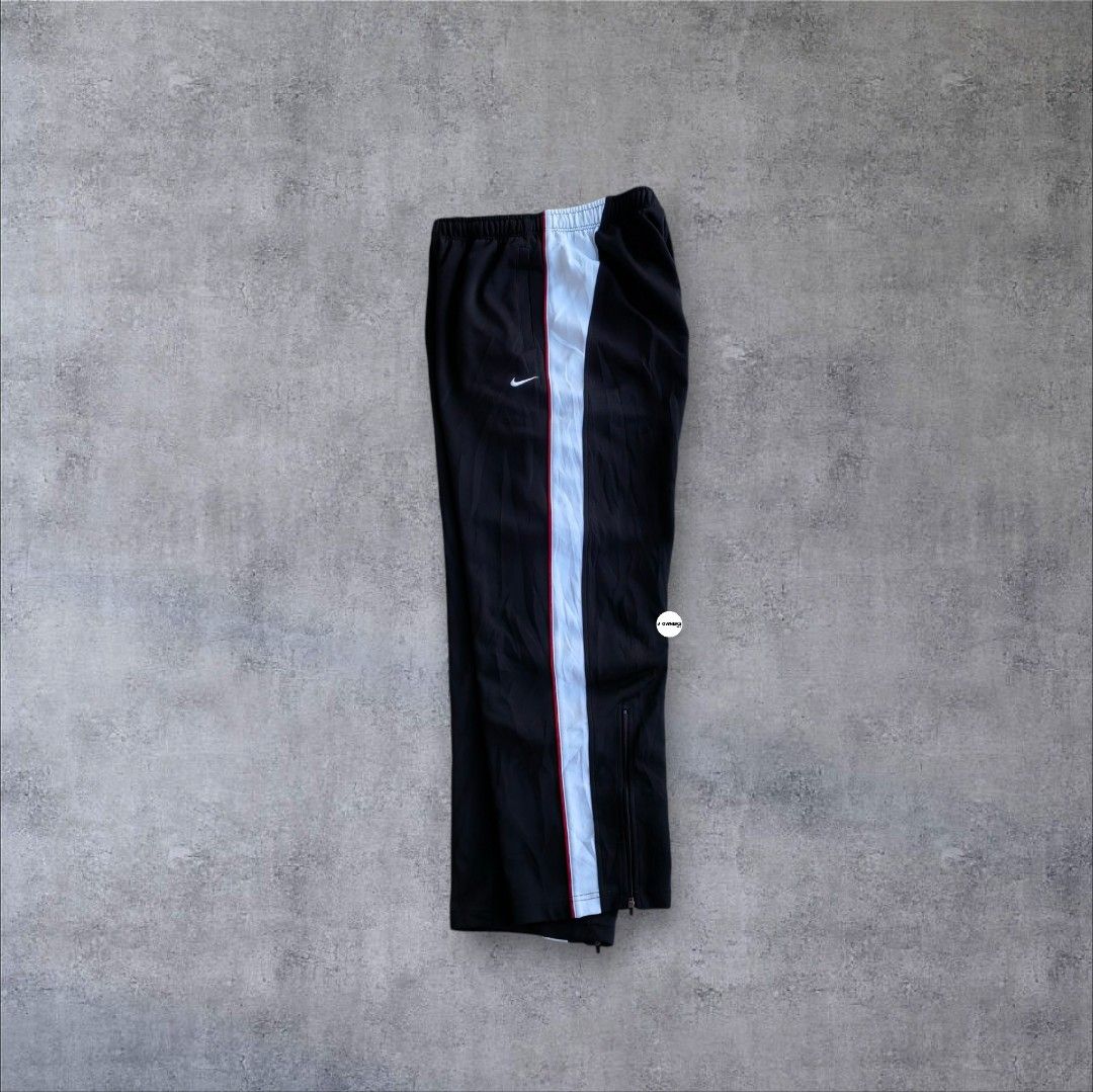Vintage Y2K Nike Trackpants Embroidered Polyester (Category: Activewear) located in Pasig City. Submitted by j.ownerss (Listing ID 1469520005, Image 1). Description: FOR SALE‼️VINTAGE Y2K NIKE TRACKPANTS POLYESTER‼️ ₱650 ONLY Logo Embroidered 2 pockets With ankle zip Logo engraved in zip puller Condition: 9/10 Flaws: scratch on knee part only (refer to last slide) Waistline: 20-38 Length: 38.5 Hem: 8.3 Pickup: Allegra Garden Place Pasig Delivery 