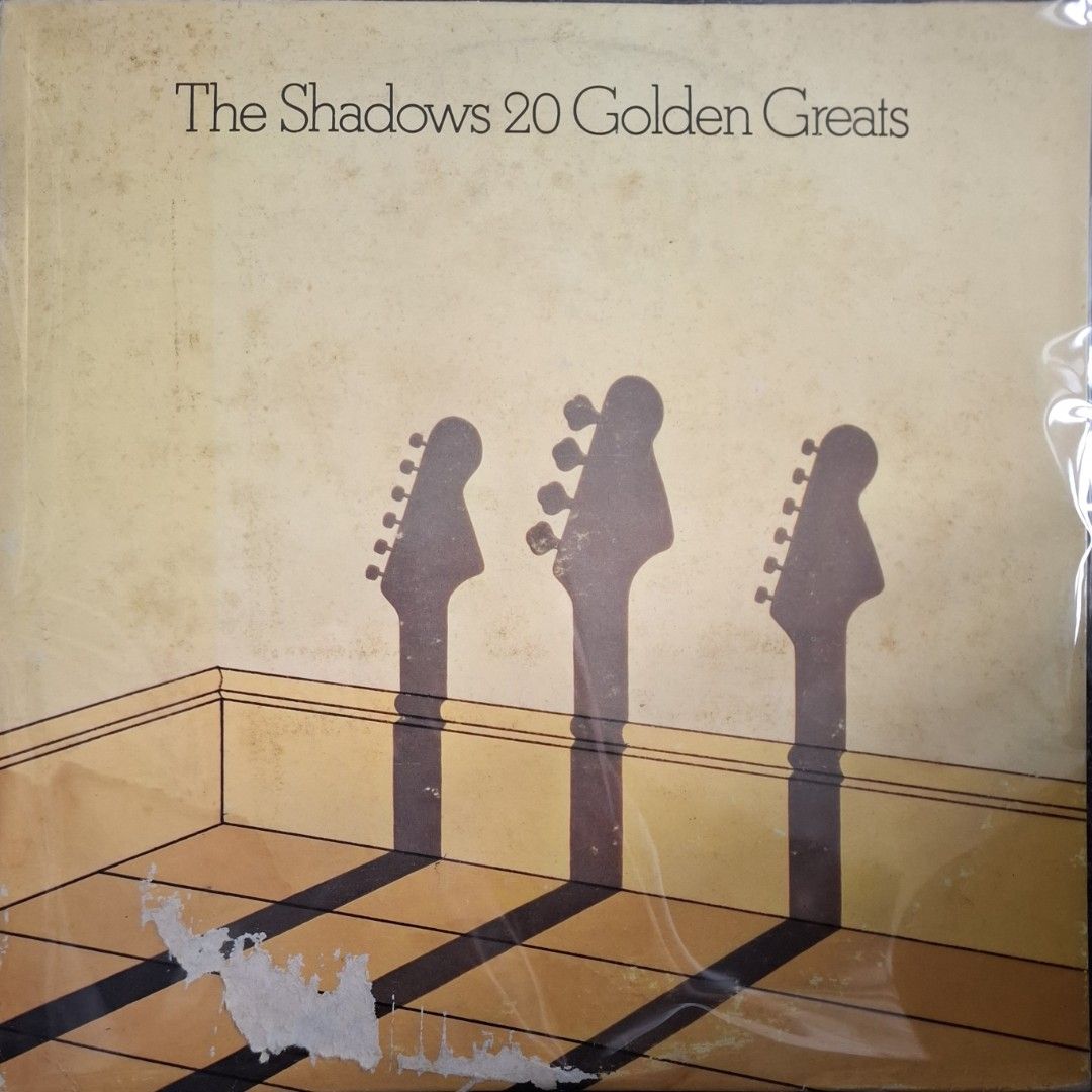 (Vinyl) The Shadows: 20 Golden Greats (Category: Vinyls) located in Makati City. Submitted by decluttermp (Listing ID 1469410847, Image 1). Description: - Local press - Tracklist includes: Apache, Wonderful Land, and FBI (Side One & Side Two) - Condition: Vinyl is Excellent ( makinis) Cover shows minor wear and tear at the bottom corner and edges - with plastic sleeve .