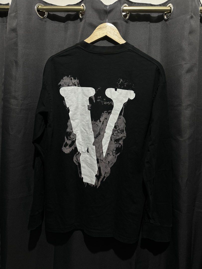 Vlone Crow / Smoke Graphics Long-Sleeve Tee (Black) (Category: Coats, Jackets and Outerwear) located in Buenavista. Submitted by themodernrack (Listing ID 1469445178, Image 2). Description: NOTE: Details on photos provided, kindly check thank you! Condition: Good condition with minimal hairlines/minor cracking on the backprint (see photos provided) Measurements & Sizing: Width (Pit to Pit): 21” Length: 28”.