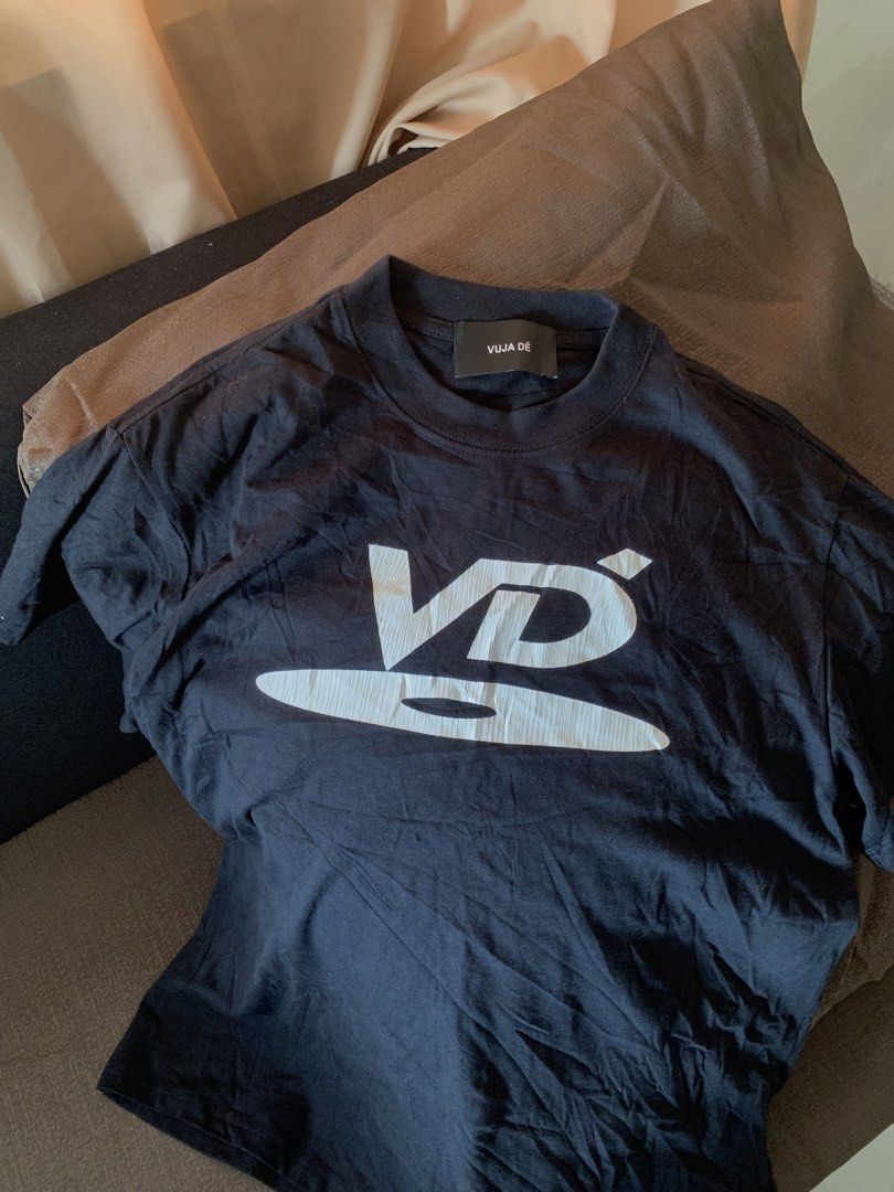 Vuja dé VD Logo Shirt (Category: Tshirts & Polo Shirts ) located in Malinao. Submitted by nhlcrza (Listing ID 1469449975, Image 1). Description: size 2 on tag 27 L” x 23 W” .