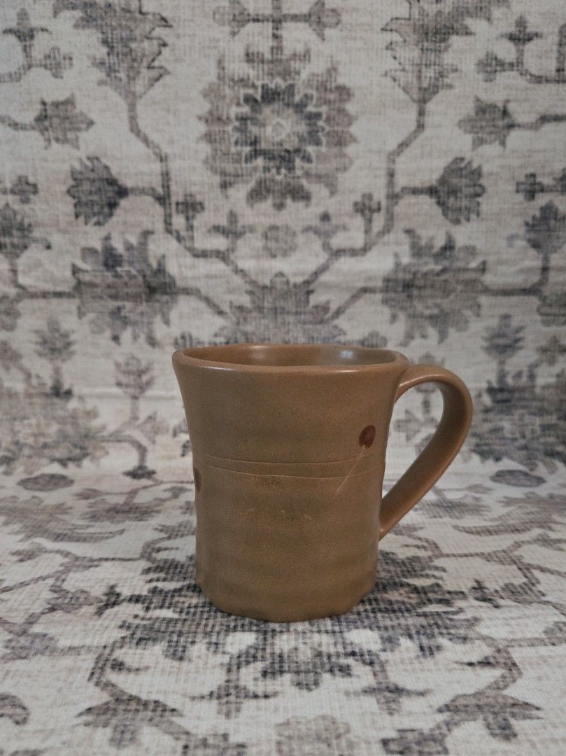 Wabisabi mug (Category: Coffee & Tea Tableware) located in Manila. Submitted by cwknds (Listing ID 1469484641, Image 1). Description: ​for lovers of raw textures and asymmetrics. this vintage piece features an effortless wabisabi silhouette that feels so grounding in hand. elevate your morning shelf or coffee bar. • 9 x 8 cm • potter's mark ~ personally sourced&curated.