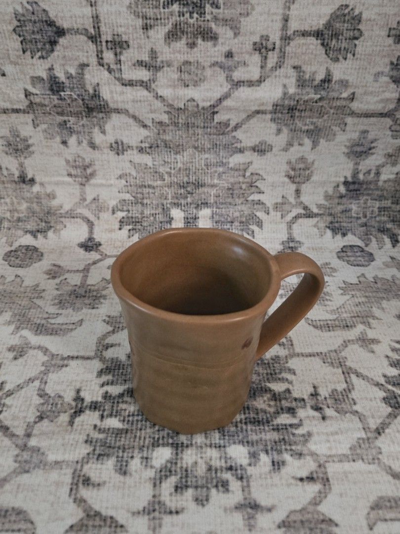 Wabisabi mug (Category: Coffee & Tea Tableware) located in Manila. Submitted by cwknds (Listing ID 1469484641, Image 2). Description: ​for lovers of raw textures and asymmetrics. this vintage piece features an effortless wabisabi silhouette that feels so grounding in hand. elevate your morning shelf or coffee bar. • 9 x 8 cm • potter's mark ~ personally sourced&curated.