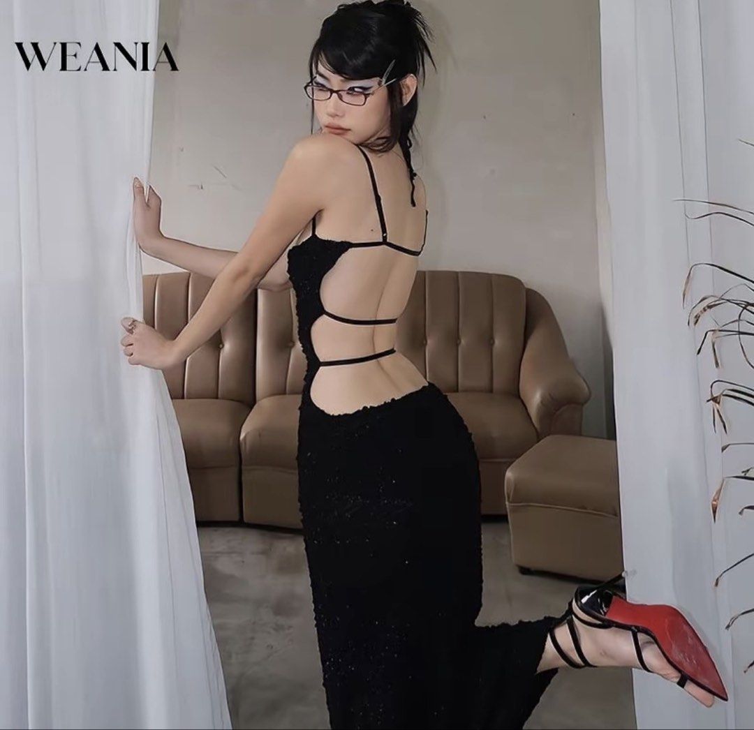 Weania Black Sparkly Backless Long Dress (Category: Evening dresses & gowns) located in Manila. Submitted by pattydeclutters (Listing ID 1469412601, Image 2). Description: - Brand: Weania size small to medium - Material: Textured knit with a soft, fuzzy finish - Design: Spaghetti straps, daring open back with horizontal strap details - Fit: Figure-hugging, floor-length maxi dress - Occasion: Perfect for evening events, parties, and night outs .
