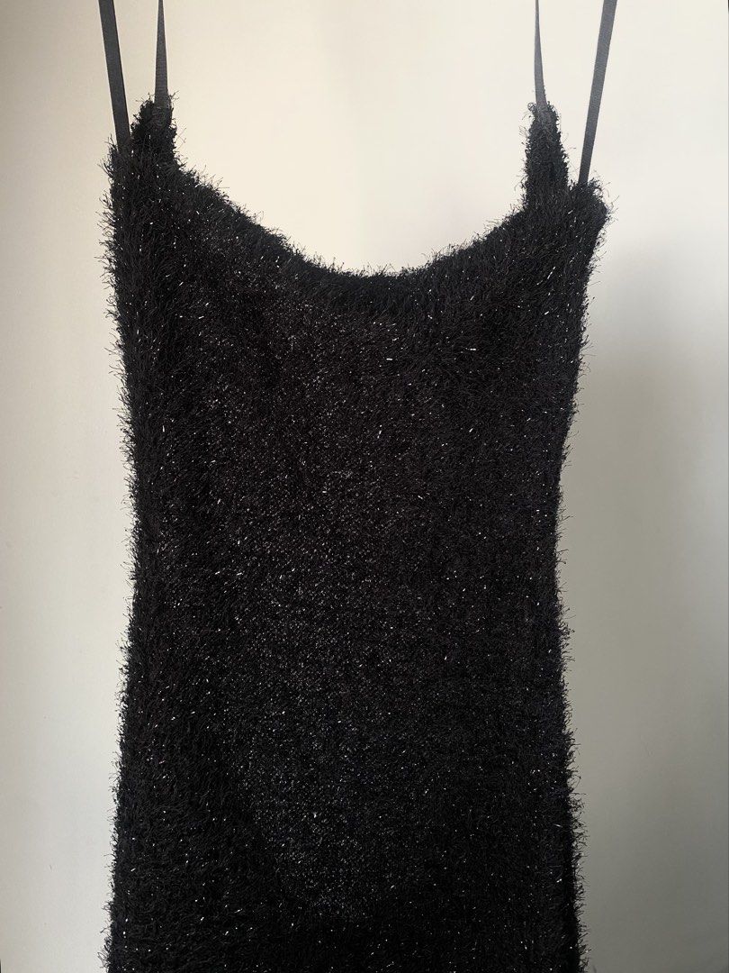 Weania Black Sparkly Backless Long Dress (Category: Evening dresses & gowns) located in Manila. Submitted by pattydeclutters (Listing ID 1469412601, Image 3). Description: - Brand: Weania size small to medium - Material: Textured knit with a soft, fuzzy finish - Design: Spaghetti straps, daring open back with horizontal strap details - Fit: Figure-hugging, floor-length maxi dress - Occasion: Perfect for evening events, parties, and night outs .