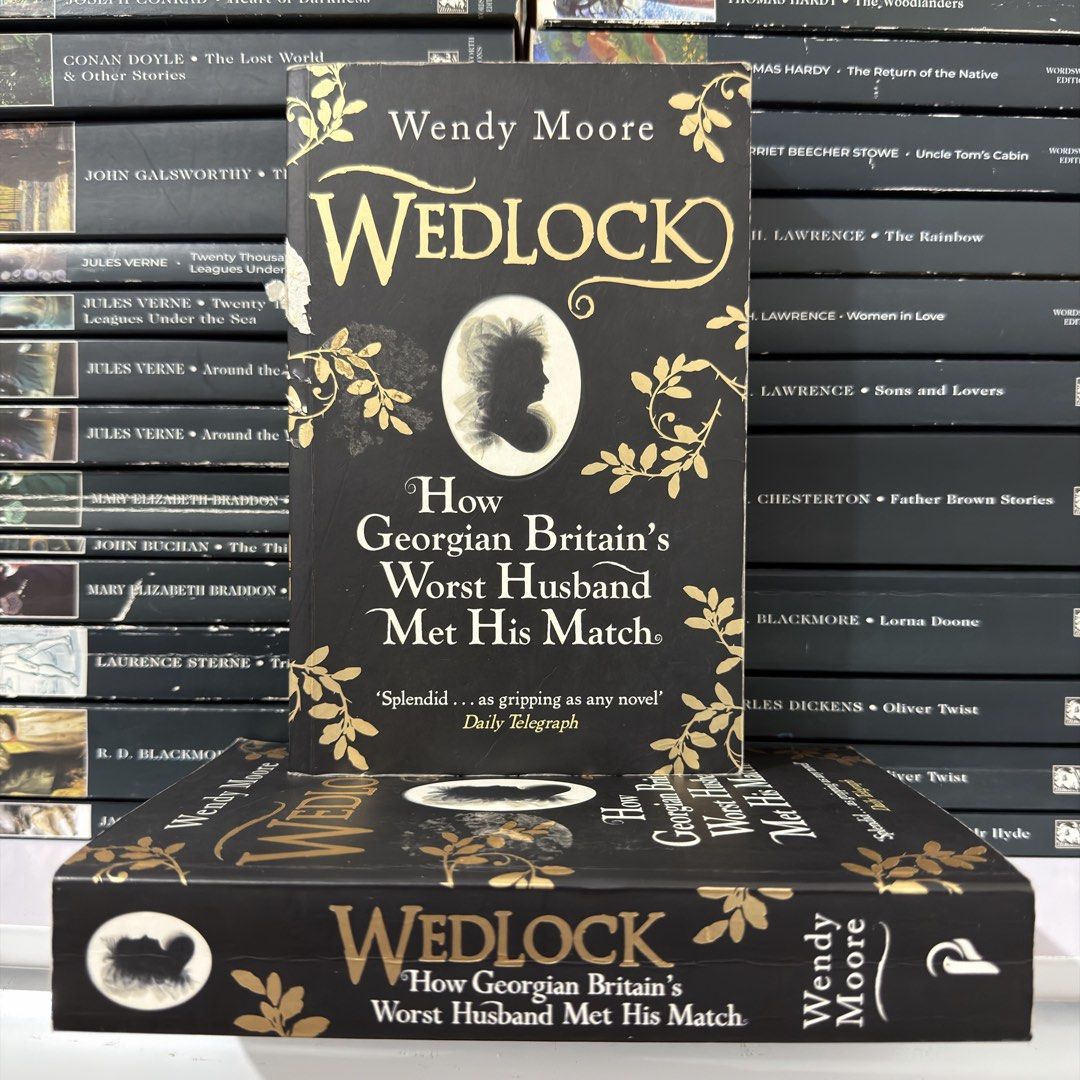 Wedlock by Wendy Moore Paperback Book (Category: Storybooks) located in Lingayen. Submitted by readwjane (Listing ID 1469474011, Image 1). Description: - Title: Wedlock by Wendy Moore - Subtitle: How Georgian Britain's Worst Husband Met His Match - Format: Paperback - Design: Elegant black cover with gold lettering and floral details - Perfect for: History buffs and fans of gripping true stories - Condition: Good pre-loved condition (message for 