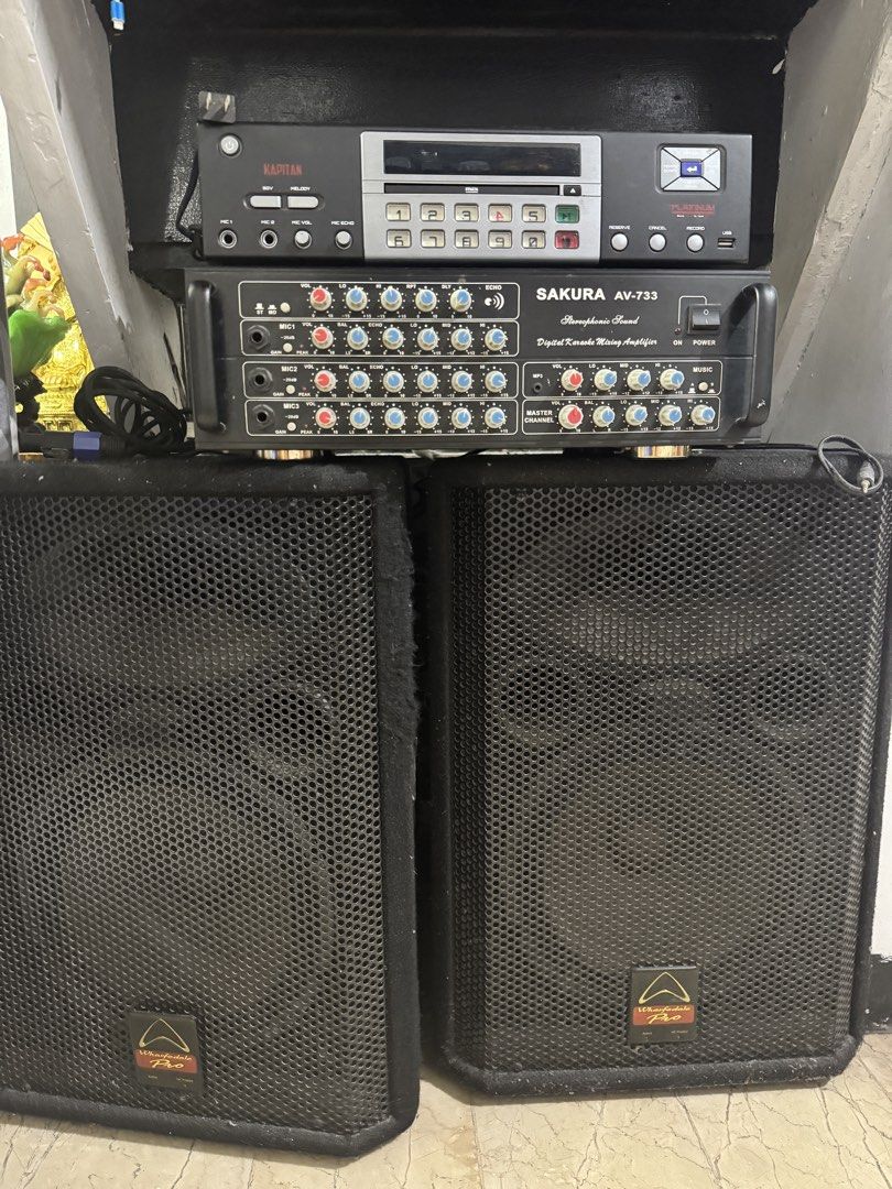 Wharfedale Pro Audio Speaker Cabinet (Category: Soundbars, Speakers & Amplifiers) located in Quezon City. Submitted by chi__028 (Listing ID 1469332073, Image 1). Description: 2 Speakers - Brand/Model: Wharfedale Pro speaker box - Build: Heavy-duty cabinet design with black metal mesh grille - Condition: Solid build with clear logo badge - Application: Ideal for stage or studio monitoring - Performance: Delivers solid, clear sound performance.