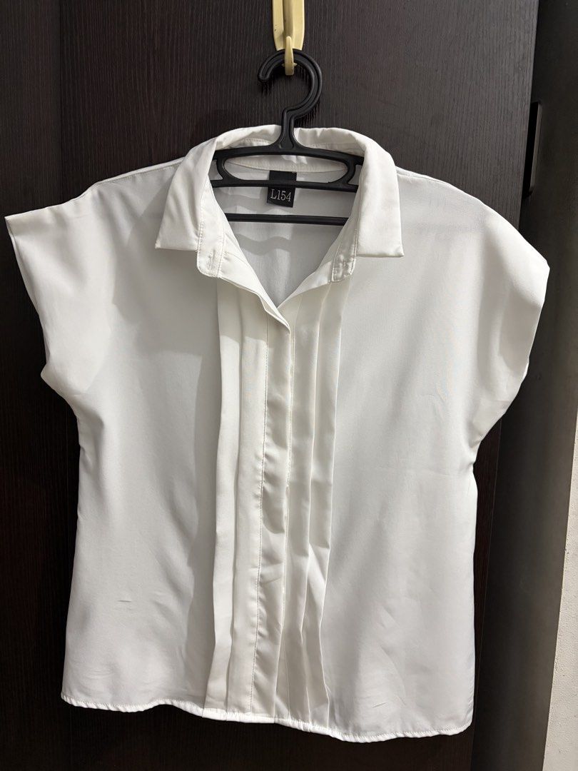 White Blouse Top (Category: Blouses) located in Manila. Submitted by kloseta_manila (Listing ID 1469549537, Image 1). Description: Bought from Thailand Washed but never worn This is perfect for board exam takers Small-Medium.