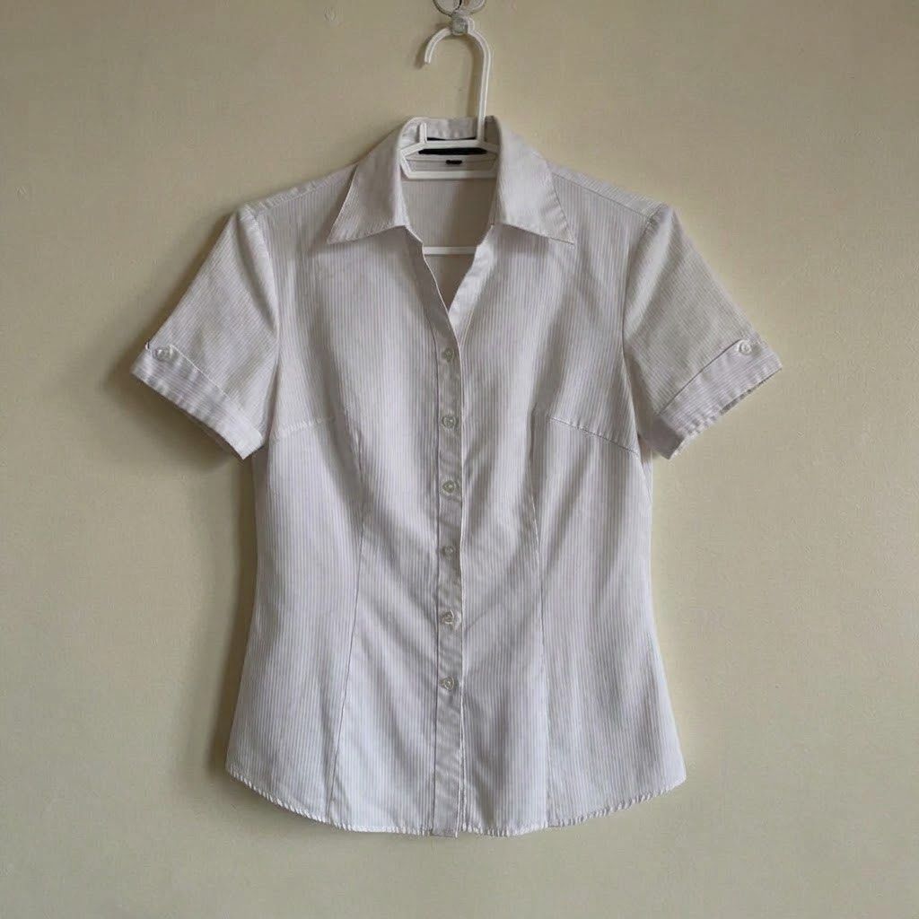 White Button down Fitted Blouse (Category: Blouses) located in Legazpi City. Submitted by veilistics (Listing ID 1469453296, Image 1). Description: ❌ sensitive stain in 2nd slide dm “mine” to claim exclusive of sf .